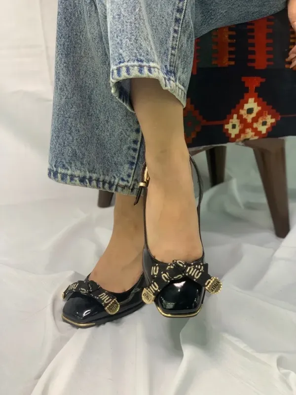 مجلسی زنانه مشکی پاپیون طلایی